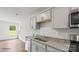 Kitchen boasts granite countertops and stainless steel dishwasher at 1411 5Th Street Ne Dr, Hickory, NC 28601