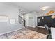 Entryway with a built-in bench, staircase, and hardwood floors at 143 Tetcott St, Mooresville, NC 28115