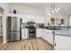 Modern kitchen with stainless steel appliances and white cabinets at 1953 Stonewyck Ave, Kannapolis, NC 28081