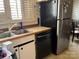 The kitchen features modern appliances and ample counter space at 212 W Bingham St, Statesville, NC 28677