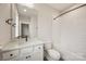 Stylish bathroom features white vanity and shower-tub combination at 225 Davidson Gateway Dr, Davidson, NC 28036