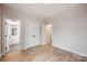 Bright bedroom featuring ensuite bath and closet access at 225 Davidson Gateway Dr, Davidson, NC 28036