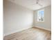 Bright bedroom features sleek ceiling fan and a sunlit window at 225 Davidson Gateway Dr, Davidson, NC 28036