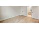 Bright bedroom featuring closet access and minimalist interior design at 225 Davidson Gateway Dr, Davidson, NC 28036