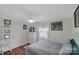 Well-lit bedroom featuring hardwood floors and ample closet space at 2714 Springway Dr, Charlotte, NC 28205