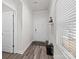 Bright foyer with neutral walls, wood floors, and bench at 310 Hyssop Ct, Fort Mill, SC 29715