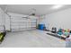 Attached garage with storage and space for multiple vehicles at 310 Hyssop Ct, Fort Mill, SC 29715