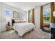 Secondary bedroom with large bed and gold curtains at 3103 Beacon Heights Rd, Indian Land, SC 29707