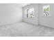 Light and airy bedroom with plush carpet and windows providing natural light at 3107 Beacon Heights Rd, Indian Land, SC 29707