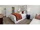 Bedroom with decorative headboard, throw pillows, neutral-toned walls, and plush carpet at 3107 Beacon Heights Rd, Indian Land, SC 29707