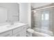 Modern bathroom with a glass-enclosed shower, vanity, and neutral tile flooring at 3109 Beacon Heights Rd, Indian Land, SC 29707