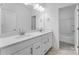 Elegant bathroom with dual vanities, modern fixtures, and a separate tub and shower at 3111 Beacon Heights Rd, Indian Land, SC 29707