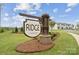 The community's entrance sign, 'Ridge at Sugar Creek', is surrounded by meticulously maintained landscaping and attractive new homes at 3111 Beacon Heights Rd, Indian Land, SC 29707
