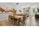 Dining area with wood table and chairs, adjacent to the living room and kitchen at 3111 Beacon Heights Rd, Indian Land, SC 29707