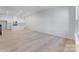 Spacious living area with hardwood floors, open layout to the kitchen, and lots of natural light at 3111 Beacon Heights Rd, Indian Land, SC 29707