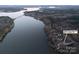 Lakefront property view showcasing house and waterfront lot at 42610 Moonshine Dr, New London, NC 28127