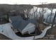 Lakefront home with expansive driveway and beautiful landscaping at 42610 Moonshine Dr, New London, NC 28127