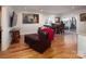 Spacious basement recreation room with leather furniture at 42610 Moonshine Dr, New London, NC 28127