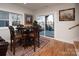 Basement sitting area with glass-top table and lake views at 42610 Moonshine Dr, New London, NC 28127