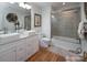 Modern bathroom with double sinks and a walk-in shower at 42610 Moonshine Dr, New London, NC 28127