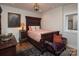 Cozy bedroom with antique bed and unique decor at 42610 Moonshine Dr, New London, NC 28127
