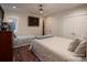 Charming bedroom with two twin beds, a full-size bed, and a window with natural light at 42610 Moonshine Dr, New London, NC 28127