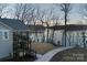 Two story deck overlooking lake, offering serene views at 42610 Moonshine Dr, New London, NC 28127