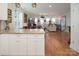 Open concept kitchen with breakfast bar, overlooking living room at 42610 Moonshine Dr, New London, NC 28127