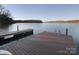 Private dock with lake access for swimming and boating at 42610 Moonshine Dr, New London, NC 28127