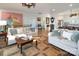 Spacious living room with hardwood floors and large art at 42610 Moonshine Dr, New London, NC 28127