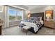 Main bedroom with plush carpet and large windows at 5033 Westmead Ln, Charlotte, NC 28262