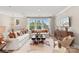 Bright living room with a large sectional sofa, coffee table and rug at 5033 Westmead Ln, Charlotte, NC 28262