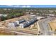Aerial view of townhomes and surrounding neighborhood at 5037 Westmead Ln, Charlotte, NC 28262
