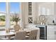 Bright dining area with stylish furnishings, wine storage and modern decor at 5037 Westmead Ln, Charlotte, NC 28262