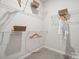 Well-organized walk-in closet features wire shelving for ample storage at 5037 Westmead Ln, Charlotte, NC 28262