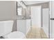 Bathroom with toilet, vanity, and access to another room at 550 Woodleaf Barber Rd, Cleveland, NC 27013