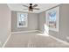 Bedroom with neutral walls, carpet, and ceiling fan at 550 Woodleaf Barber Rd, Cleveland, NC 27013