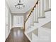 Entryway with hardwood floors and staircase at 550 Woodleaf Barber Rd, Cleveland, NC 27013