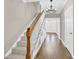 Bright entryway with hardwood floors, staircase, and chandelier at 550 Woodleaf Barber Rd, Cleveland, NC 27013