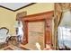 Ornate fireplace with lion head details and brick hearth at 550 Woodleaf Barber Rd, Cleveland, NC 27013