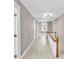 Upper hallway with neutral walls and carpeted floors at 550 Woodleaf Barber Rd, Cleveland, NC 27013