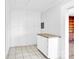 White kitchen cabinets and countertops, tile floor at 550 Woodleaf Barber Rd, Cleveland, NC 27013