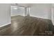Dining room with dark gray vinyl flooring and chandelier at 6041 Pinebark Ct, Charlotte, NC 28212