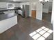 Kitchen with stainless steel appliances and tile floor at 6505 Carmel Hills Dr, Charlotte, NC 28226