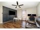 Playroom with a large TV, built-in shelving, and ' furniture at 9323 John Russell Rd, Charlotte, NC 28215