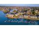 Lakefront condos boasting waterfront access with docks, swimming pool, parking and lush landscaping from an aerial view at 9801 Emerald Point Dr # 2, Charlotte, NC 28278