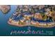 Stunning aerial view of lakefront condos, parking lot, boat docks, and swimming pool, offering luxurious waterfront living at 9801 Emerald Point Dr # 2, Charlotte, NC 28278