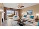 Bright living room with fireplace, waterfront views, and modern decor with natural light at 9801 Emerald Point Dr # 2, Charlotte, NC 28278