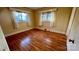 Spacious bedroom featuring hardwood floors and large windows at 1009 Robinhood Ln, Kannapolis, NC 28081