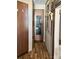 Inviting entryway with wood flooring and mirror at 106 Hummingbird Cir, New London, NC 27281